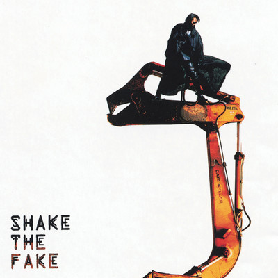 SHAKE THE FAKE Front Cover
