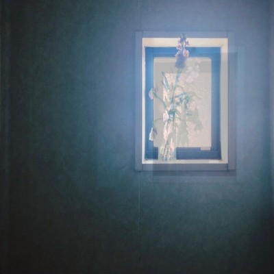 rakuen Front Cover