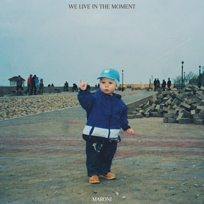 We Live in the moment Front Cover