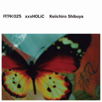 ATAK025 xxxHOLiC Front Cover