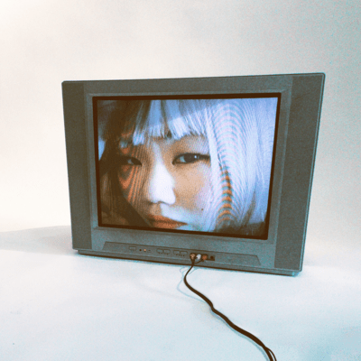 Woman on TV Front Cover