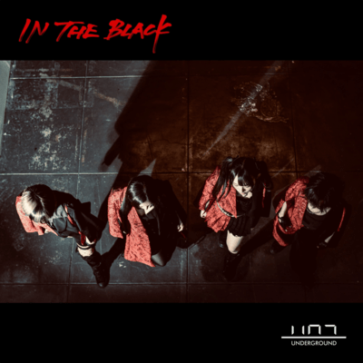 IN THE BLACK Front Cover