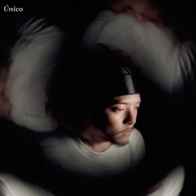 Único Front Cover